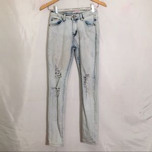 Acid washed distressed jeans